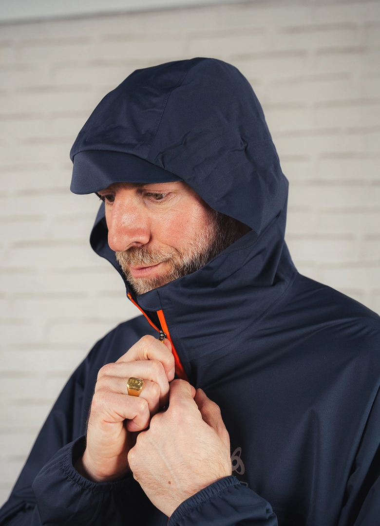 Tenue courir pluie capuche